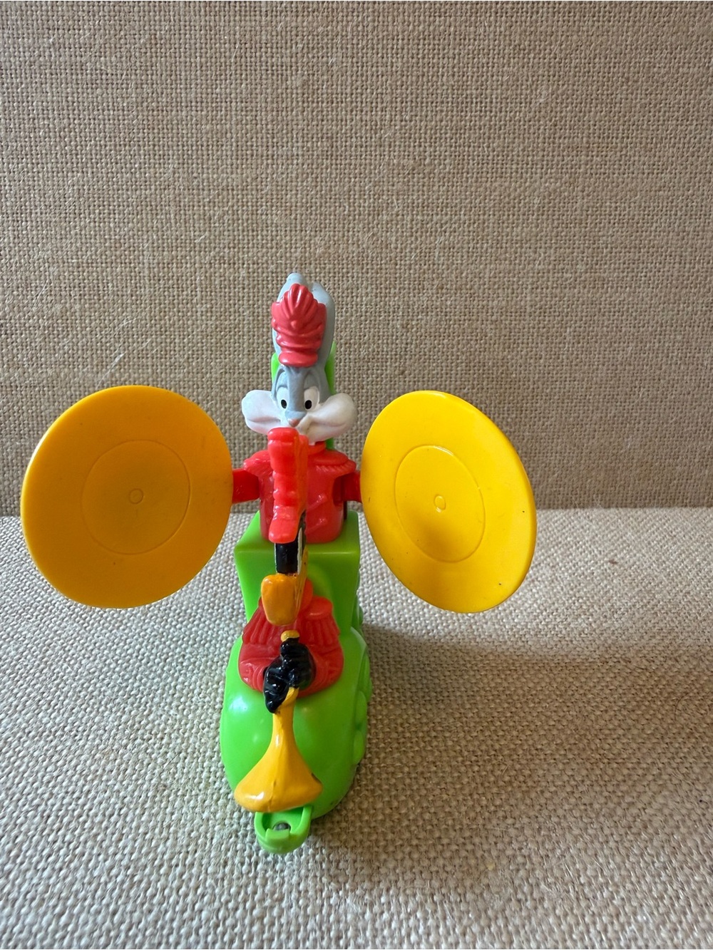 Warner Bros. Cartoon Percussion Rider Toy - Green, Yellow, Red